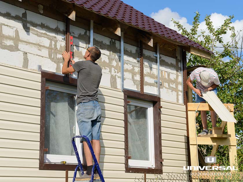 Siding contractor in Kannapolis, NC installing durable exterior siding for a residential home