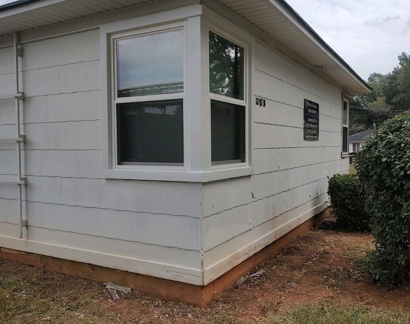 Home exterior featuring custom windows by Speaks Custom Window and Sunrooms