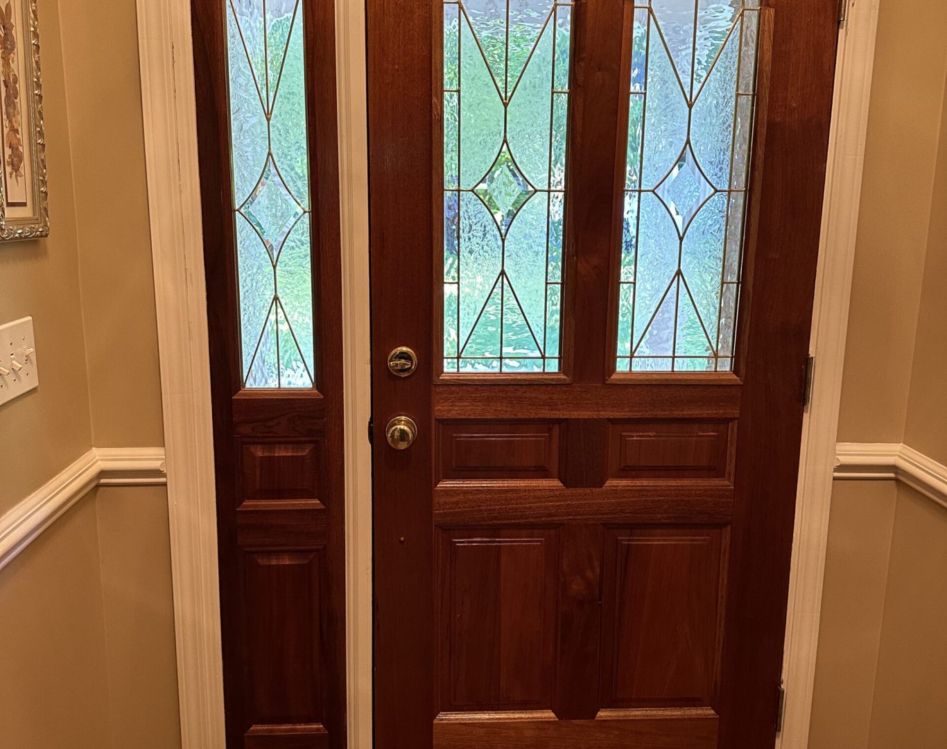 Entry Door Replacement in Huntersville - NC underway as a technician adjusts a new front threshold