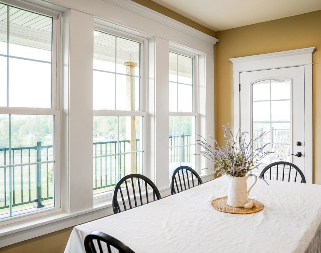 Expert adjusting new custom window frame during installation process