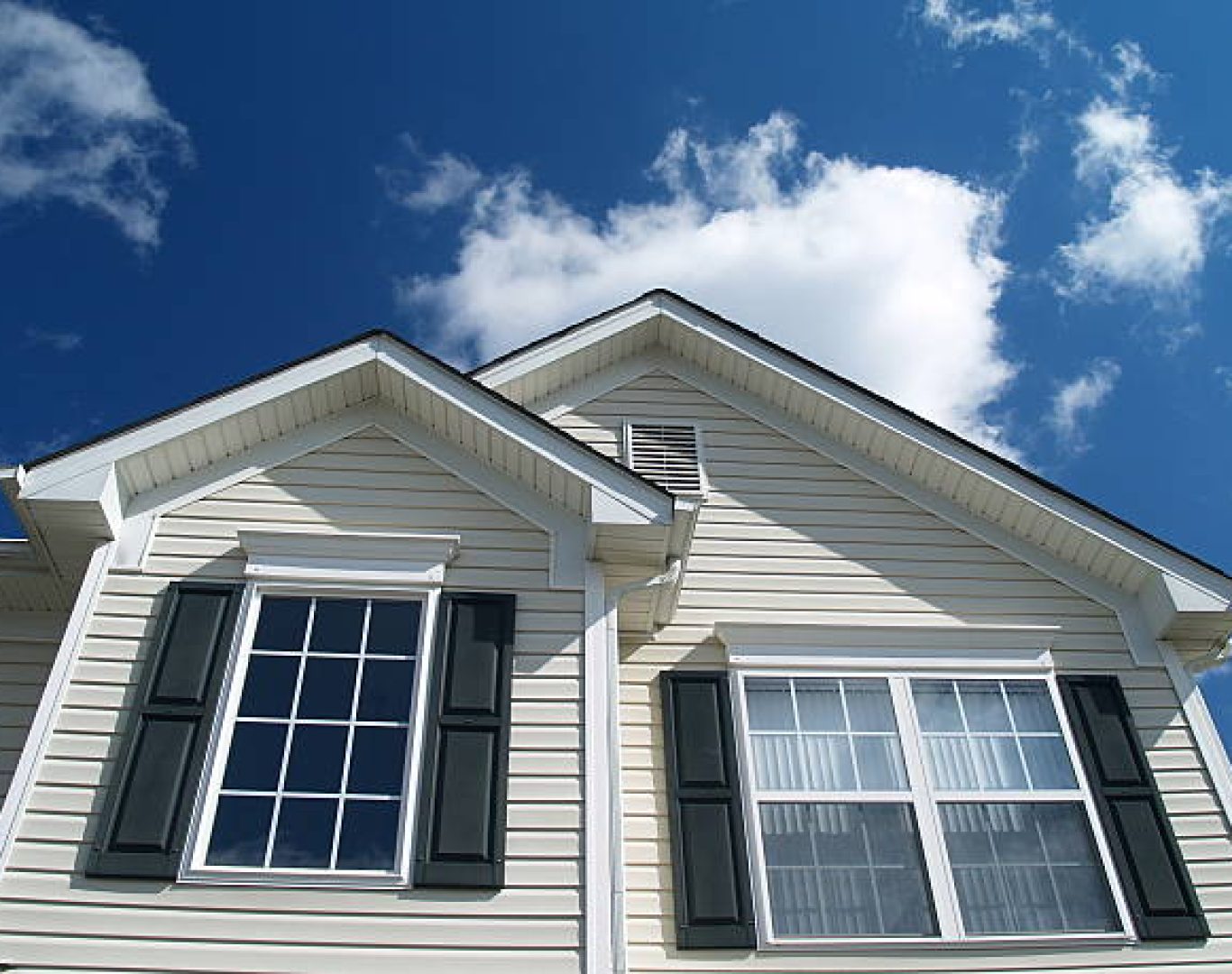 Speaks Custom Window and Sunrooms installing custom storm windows securely