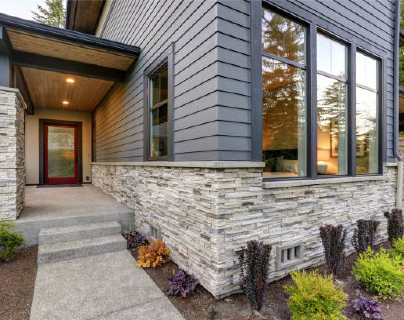 Speaks Custom Window and Sunrooms installing modern bay window system