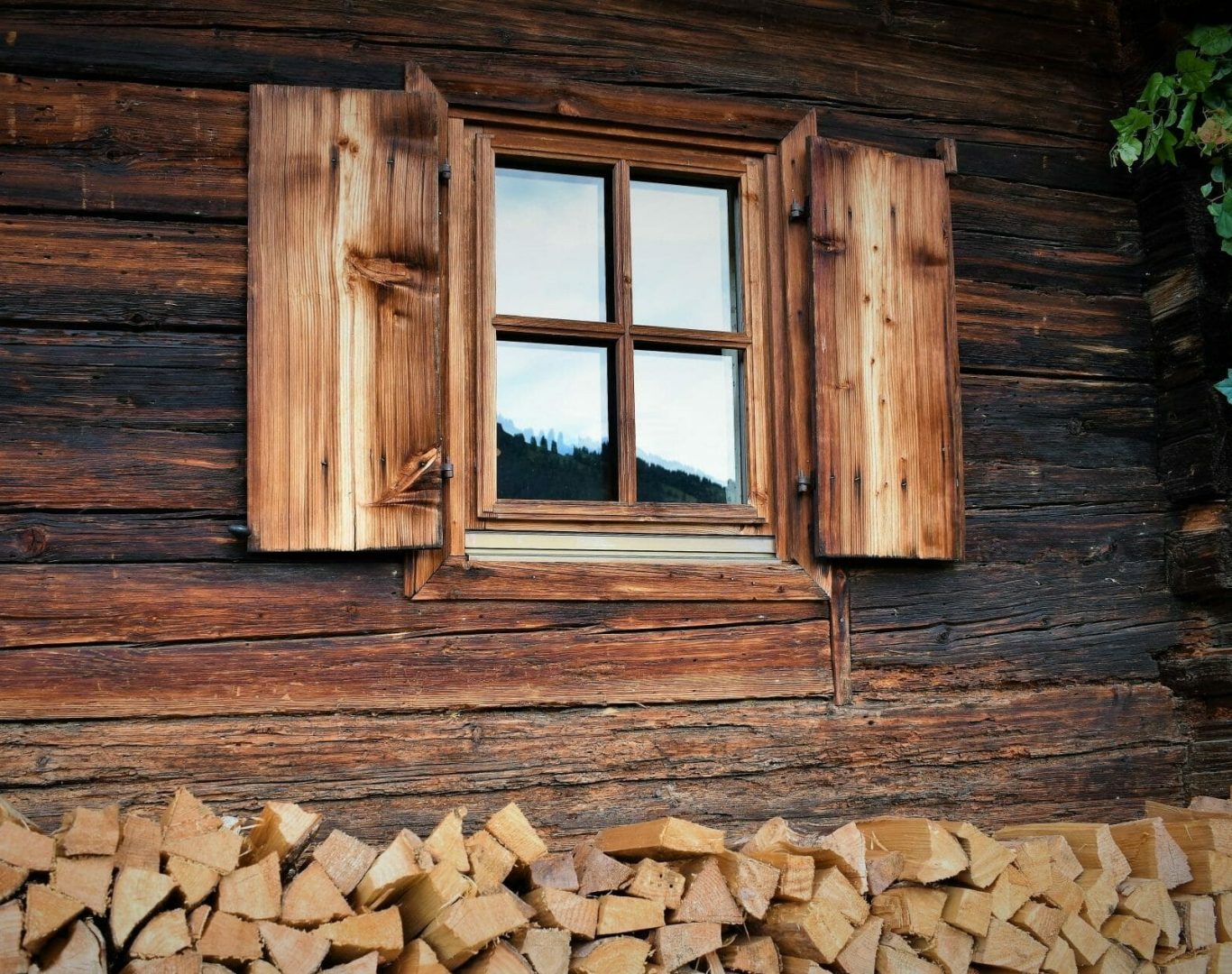 Historical Windows in Mooresville - NC being measured as an installer checks original wood trim